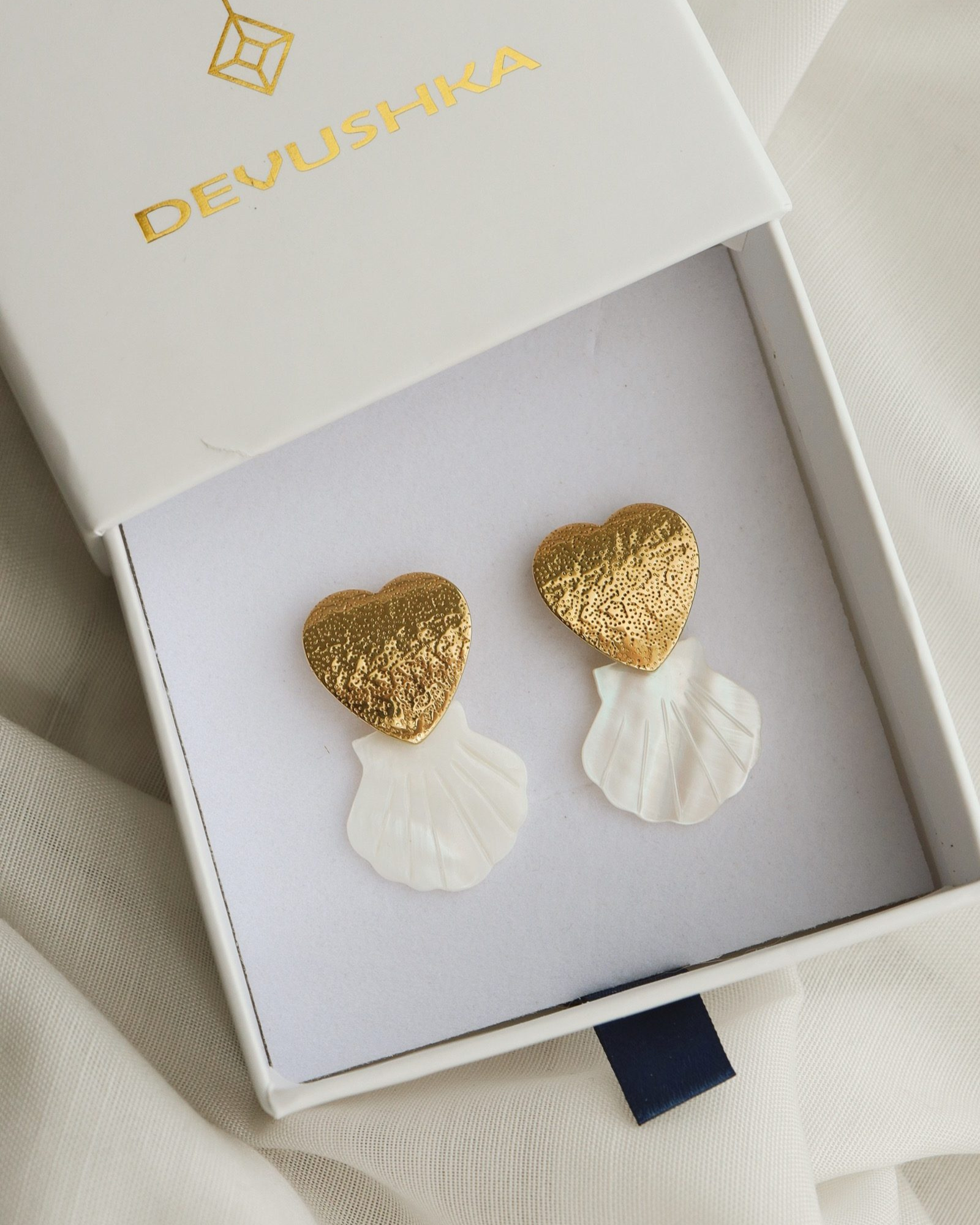 naušnice morska školjka